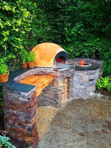 Tandoor oven, prep space and Pizza oven all in one! This will be a must-do project once we buy a place_